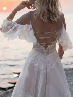 Boho Wedding Dresses 2026 A Line Deep V Neck Straps Lace Short Sleeve Bridal Gown For Beach Wedding With Sweep Train