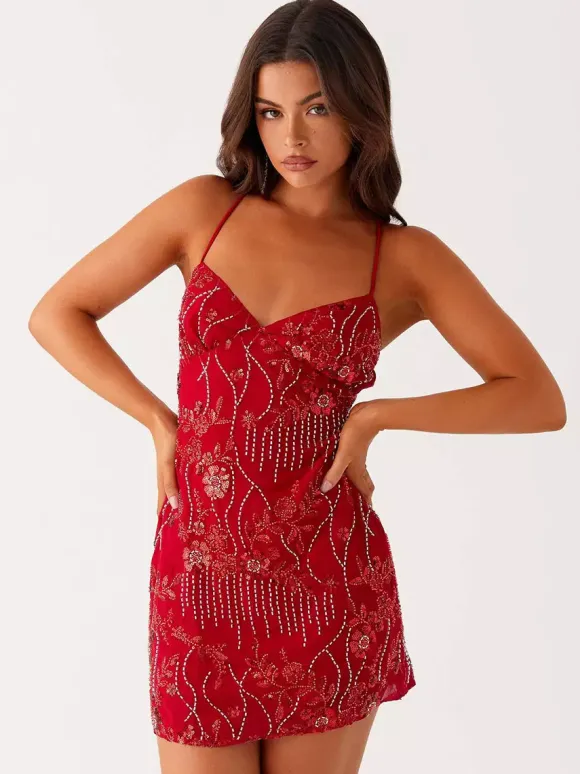 Chic Fitted Orange Gown With Floral Sequin Detail Perfect For Parties