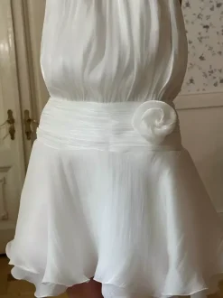 Flattering White Halter Mini Dress Ideal For Casual Outings