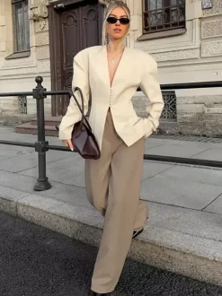 Women Sleeveless Collarless V Neck Peplum Blazer Single Row Pearl Button Fitted Jacket